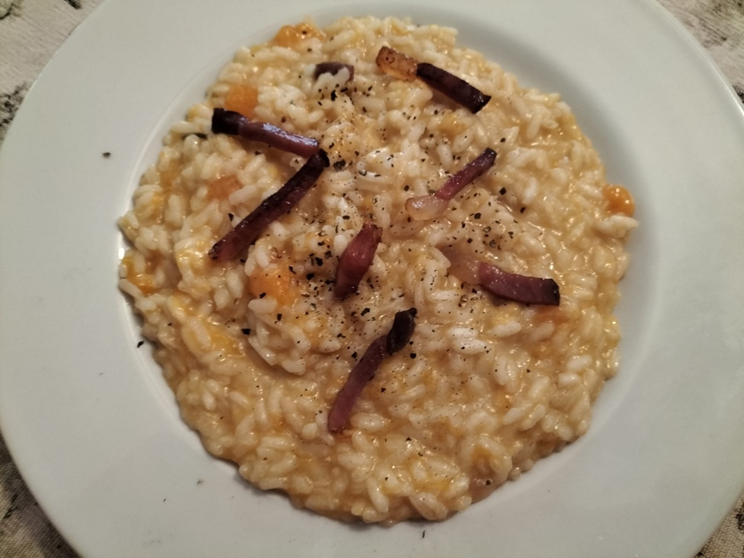 Risotto con zucca, speck e gorgonzola 